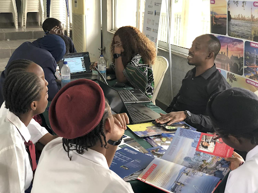 Travel consultant assisting clients with passports, visas, and international travel planning.